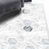 alfombra-hexagonos-marmol-sillon